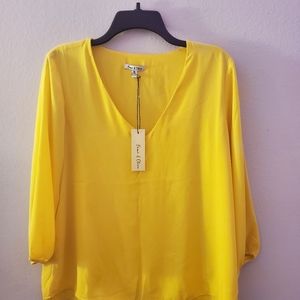 Brand new yellow silk top size medium
